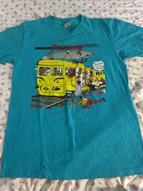 Supreme Teal Punany Train' Graphic Tee